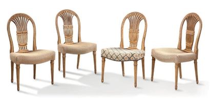 null Suite of 4 chairs with a sheaf back in carved, painted and gilded wood
Louis...