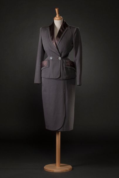 Marcel Rochas Suit in mouse grey woollen fabric with matching satin collar and pockets....