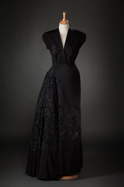 MANGUIN Evening dress in black taffeta embroidered with asymmetrical patterns in...