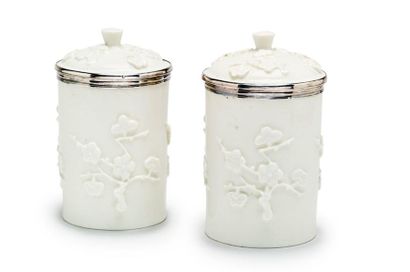 SAINT-CLOUD Pair of white enamelled covered cylindrical tobacco jars in soft porcelain,...