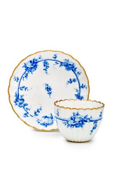 SÈVRES Fluted teacup and saucer in soft porcelain, decorated in blue monochrome with...