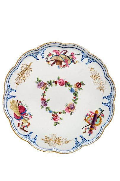 SÈVRES "Saucer on foot" in soft porcelain from the Louis XV service with attributes...