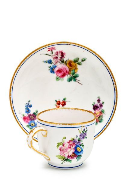 SÈVRES Bouillard cup and saucer in soft porcelain with polychrome decoration of flower...