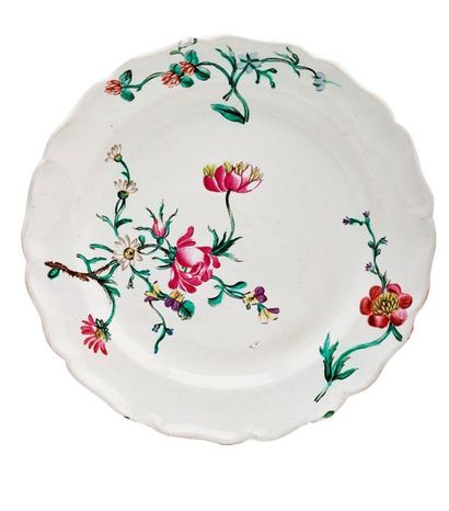 MARSEILLE Plate with contoured rim in earthenware, polychrome decoration of floral
stems...