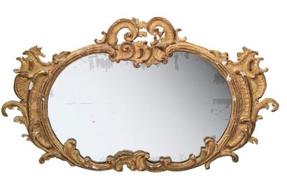 null Oval mirror in wood and gilded stucco decorated with scrolls, scrolls and shells
XIXth...