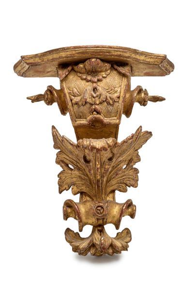 null Small console of wall lamp in carved and gilded wood with scrolls and foliage...