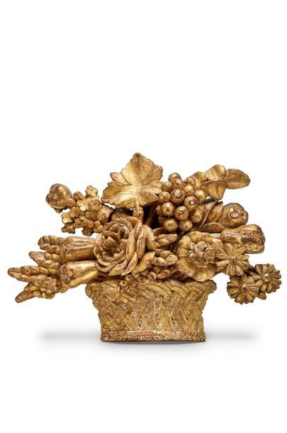 null Carved and gilt
wood basket of flowers and fruits Louis XVI period.
18 x 29...