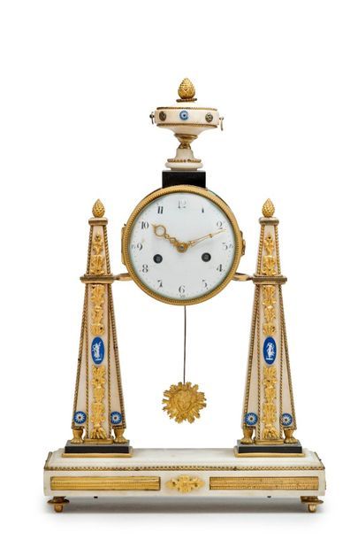 null White marble clock, gilt bronze and Wedgwood style medallions. Two obelisks...