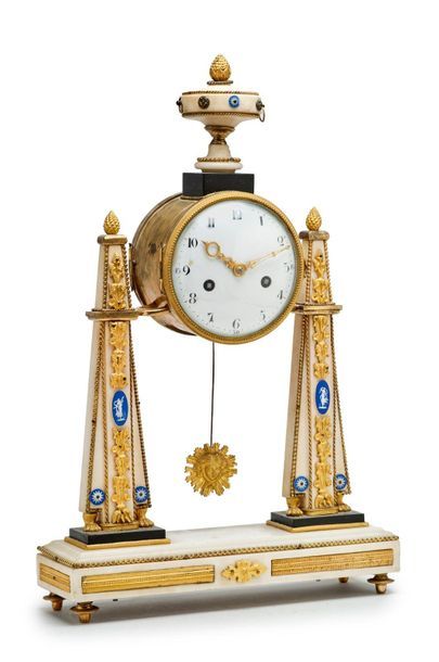null White marble clock, gilt bronze and Wedgwood style medallions. Two obelisks...