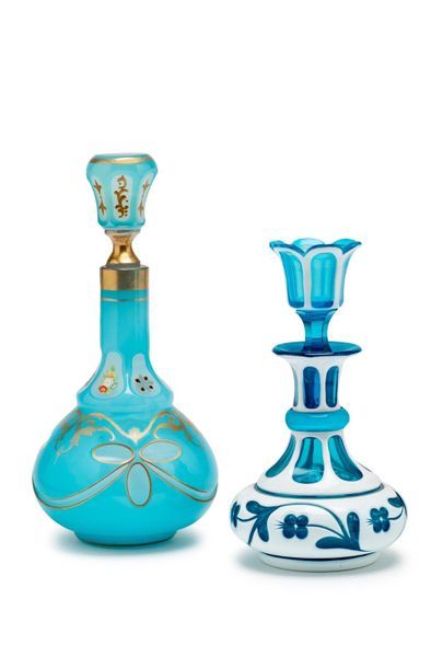 null Set including
A pear-shaped bottle in white and blue overlay glass. H. 16.5...