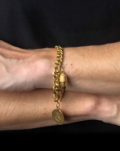 Bracelet articulé en or jaune 750 millièmes,...