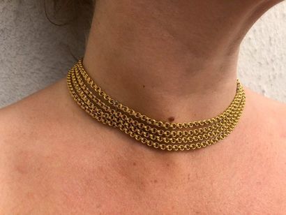 SUZANNE BELPERRON Four-row articulated necklace in 750-thousandths yellow gold, the...