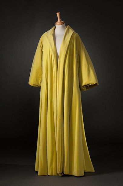 Jacques Griffe Opera coat in absinthe cotton velvet with long flared sleeves.
Around...