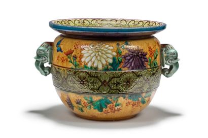 Théodore DECK (1823-1891) 
Polychrome glazed ceramic planter with floral, butterfly...