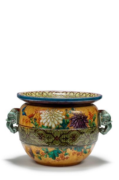 Théodore DECK (1823-1891) 
Polychrome glazed ceramic planter with floral, butterfly...