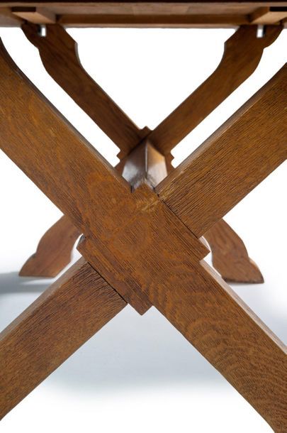 JEAN-CHARLES MOREUX (1892-1956) 
Oak dining table with rectangular top resting on...