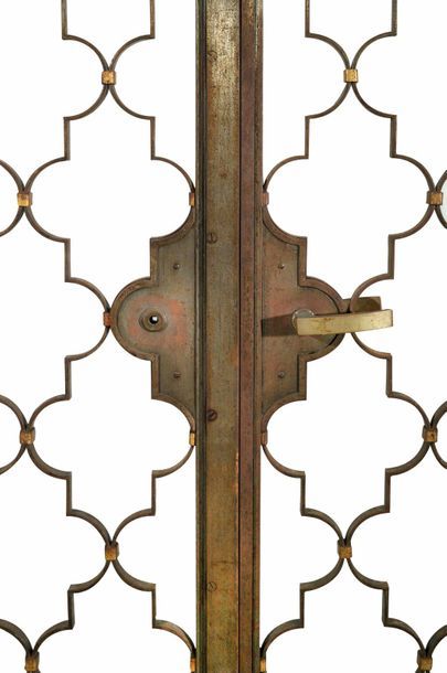 Raymond SUBES (1893-1970) 
Exceptional pair of partially gilded wrought iron doors...