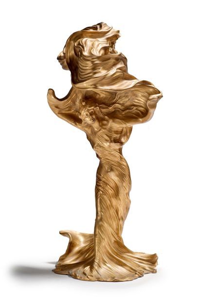 Raoul LARCHE (1860-1912) 
Loîe Fuller
Rare sculpture formant lampe en bronze doré.
Signée...