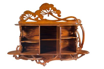 Émile GALLÉ (1846-1904) 
Walnut and exotic wood veneer "aux ombelles" wall shelf...