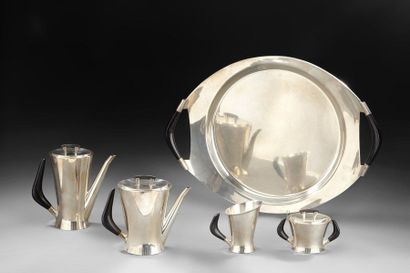 TRAVAIL ESPAGNOL 1960 
Service in silver metal and ebony including a tray, a teapot,...