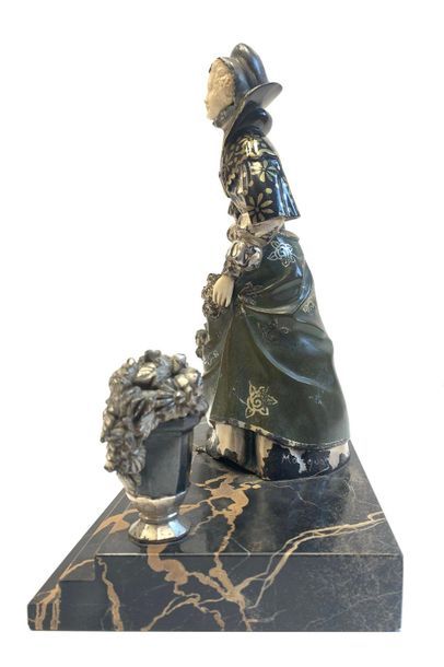 RENE PAUL MARQUET (1875-1939) 
Bronze sculpture with green, black and silver patina...