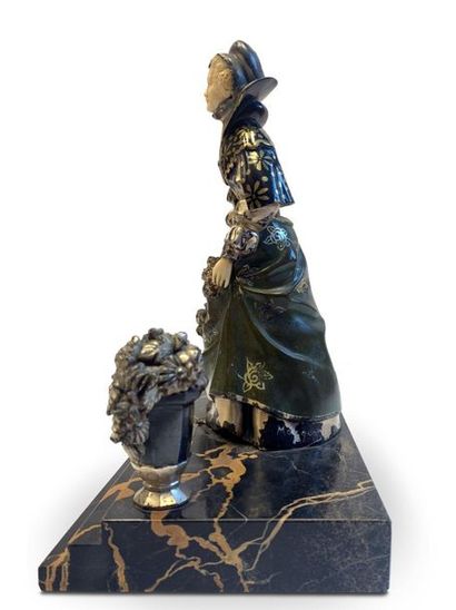 RENE PAUL MARQUET (1875-1939) 
Bronze sculpture with green, black and silver patina...