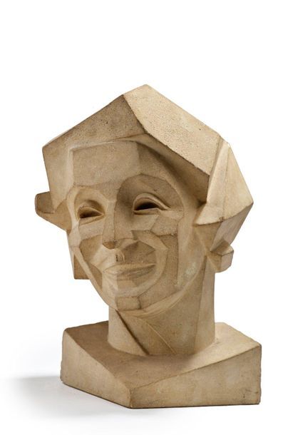 Travail des années 1920 
Cubic sculpture in carved stone showing a man's head
Signed...