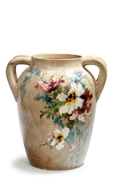 MOUTIGNY- SUR-LOING 
Important vase à double anses à décor de fleurs d'après Castex,...