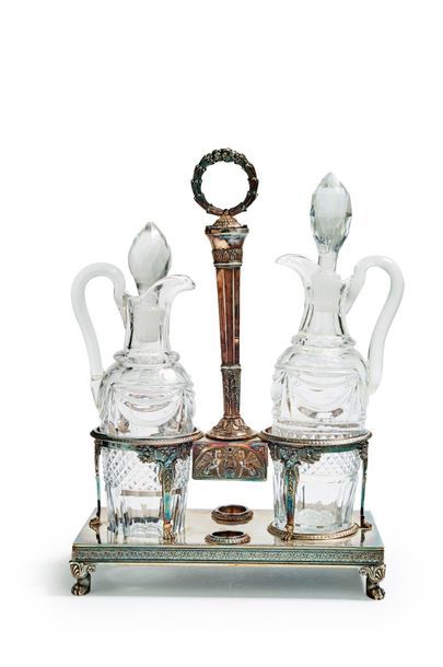 null Oil and vinegar maker in silver complete with its carafes and cut crystal stoppers,...