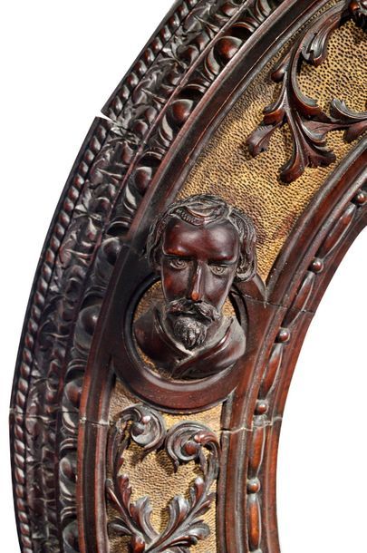 null Circular frame or tondo in carved, patinated and partially gilded wood with...