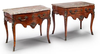 null Pair of veneered commodes called "wigs" of curved shape opening by a drawer...