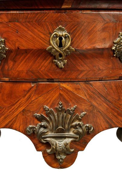 null Pair of veneered commodes called "wigs" of curved shape opening by a drawer...