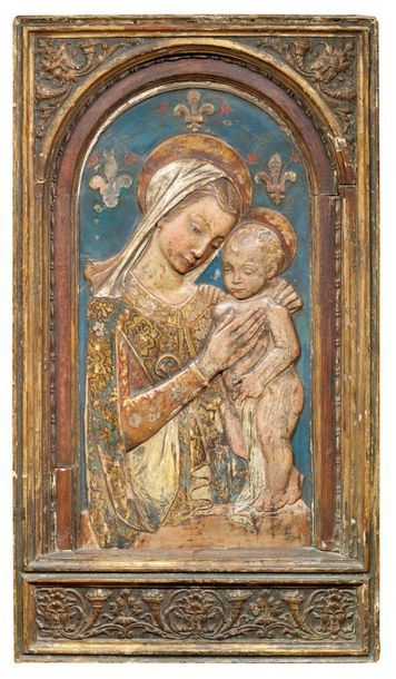 D'après Antonio ROSSELLINO 
Vierge à l'enfant
Bas relief cintré sur fond de fleurs...