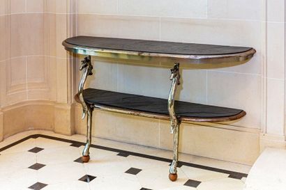 TRAVAIL MODERNE 
Console with double tops composed of a cast iron base with stylized...