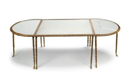 Maison BAGUÈS Tripartite coffee table with gilt bronze base. Mirror tops. (Accident...