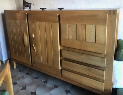 Maison Regain Elm buffet.

Opening by two doors, a flap and three drawers.