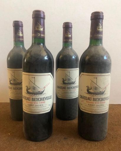 CHÂTEAU BEYCHEVELLE 1996.

(N, 1 BLT) 3 stained labels. 

4 bottles