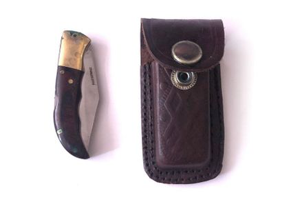null Small folding pocket knife with "Golden Eagle" point. Flanges in selected wood....