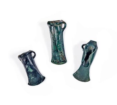 Three bronze axes: - A socket axe iron. Length:...