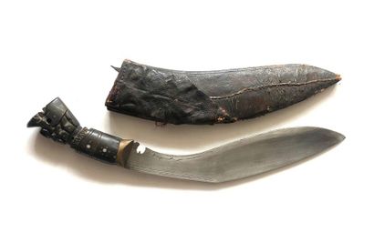 null Nepalese knife called Koukriss. Carved horn handle. Carved blade. Wooden sheath...