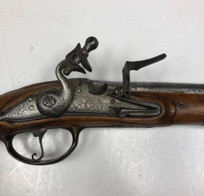 null Italian flintlock pistol. Round barrel marked "Lazarino". Engraved lock, iron...