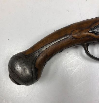 null Italian flintlock pistol. Round barrel marked "Lazarino". Engraved lock, iron...