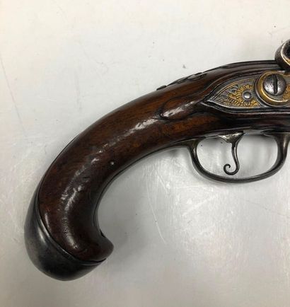 null Officer's flintlock pistol. 
Round muzzle-rifled, thunder-stained barrel, decorated...