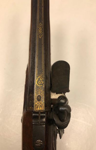 null Flintlock pommel pistol. 
Paneled barrel, slightly tromblonné, decorated with...