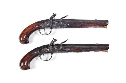 Pair of flintlock pommel pistols. Round,...