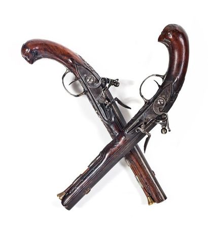 null Pair of flintlock pommel pistols. 
Round, flat and thunderbolt barrels, decorated...