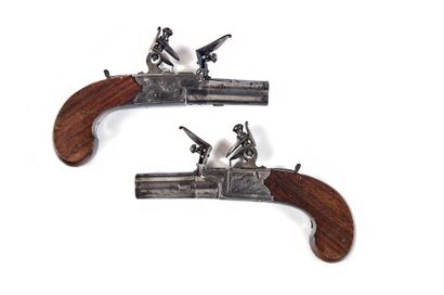 null Pair of flintlock chest pistols. 
Round barrels with forced, punched bullets....