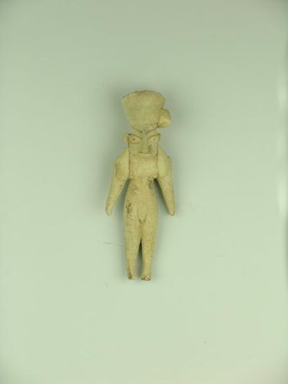 MEHRGARH (3000 av. J.C.) Idole masculine, au turban. Il porte un large collier orné...