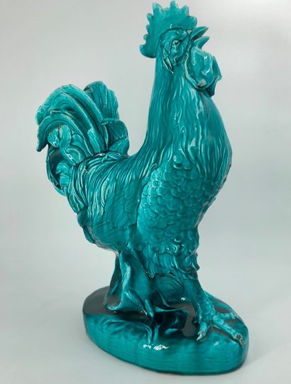 null 蓝釉陶公鸡。

高：46厘米

一些珐琅质的跳动。