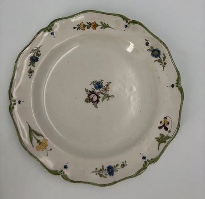 null Then five earthenware plates, flower decorations, fishing scene in a medallion,...